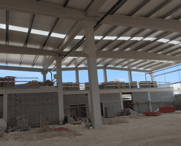 gray concrete building under blue sky during daytime